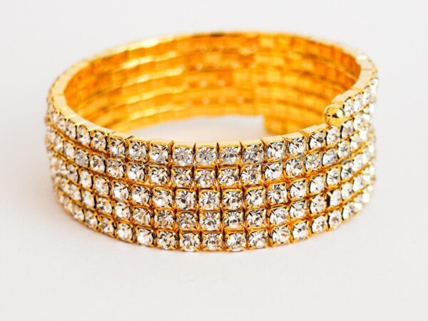 Brazalete Dorado en espiral 4 filas Strasss