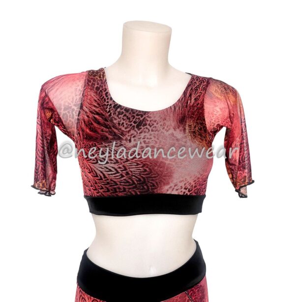Top transparente para danza del vientre con estampado de plumas en tonos cálidos.