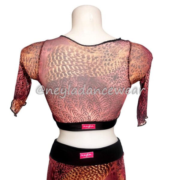 Top transparente para danza del vientre con estampado de plumas en tonos cálidos.
