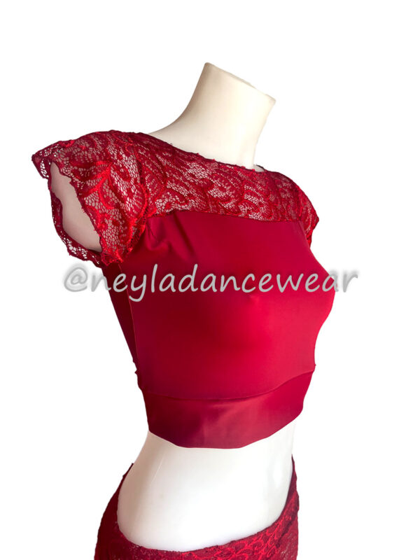 Red lace top with short sleeves and high neckline, perfect to pair with the Hiranur skirt.